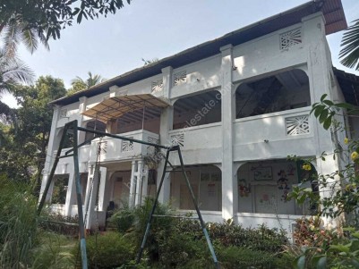Land with an Old Building for Sale at Chakkorathukulam, Kozhikode